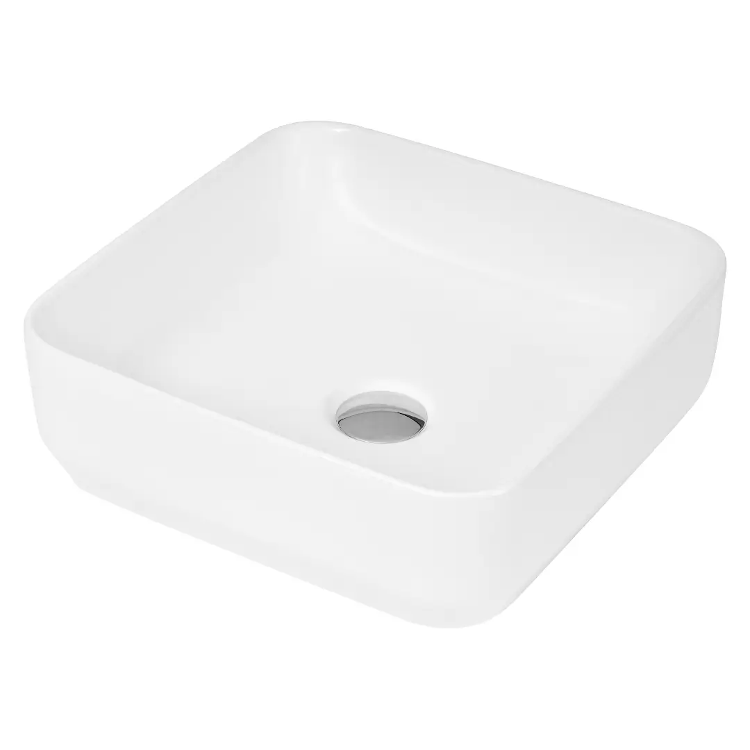 Modern white square basin with sharp lines on a countertop in a minimal bathroom, compact ceramic finish – DDL Tiles