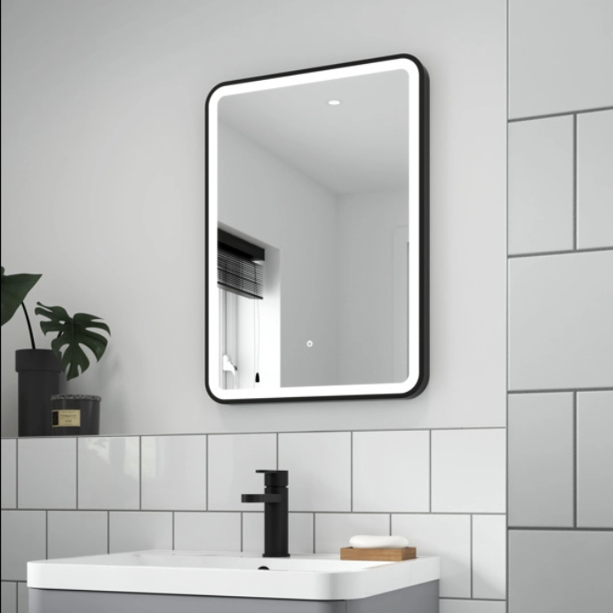 Framed chrome LED mirror with touch control, offering stylish illumination in modern interiors – DDL Tiles
