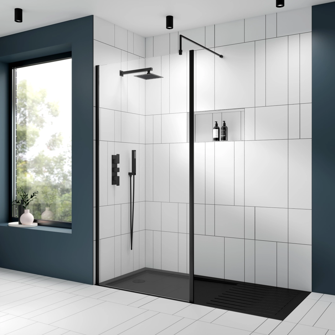 Matt black square fixed shower head providing rainfall flow in a sleek UK bathroom – bold and modern by DDL Tiles