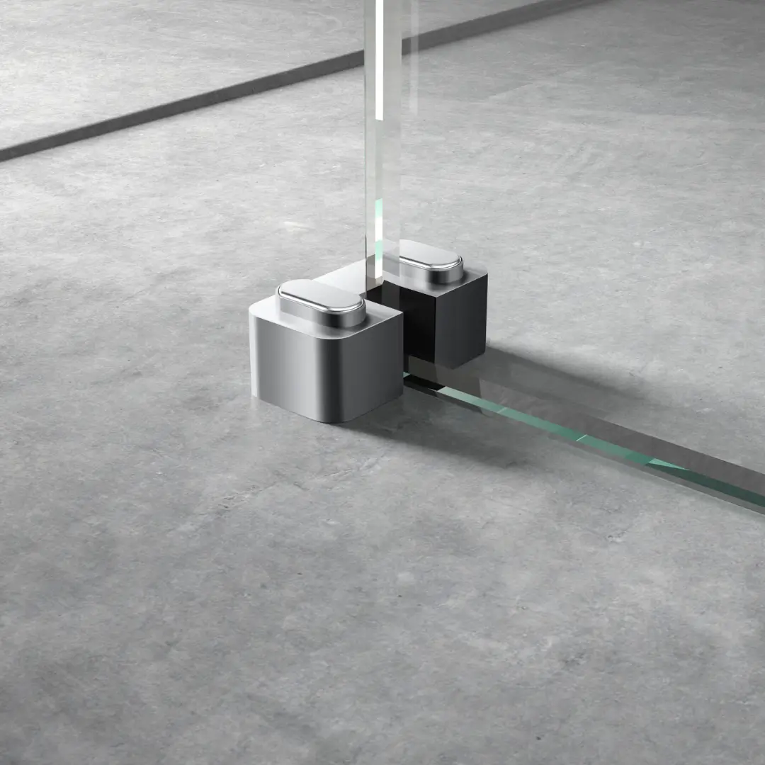 Chrome support foot fixed beneath wetroom screen providing modern alignment and base stability – DDL Tiles